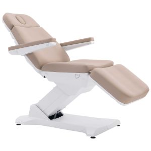 Beige padded medical recliner chair with a white base and adjustable backrest, viewed from the side.
