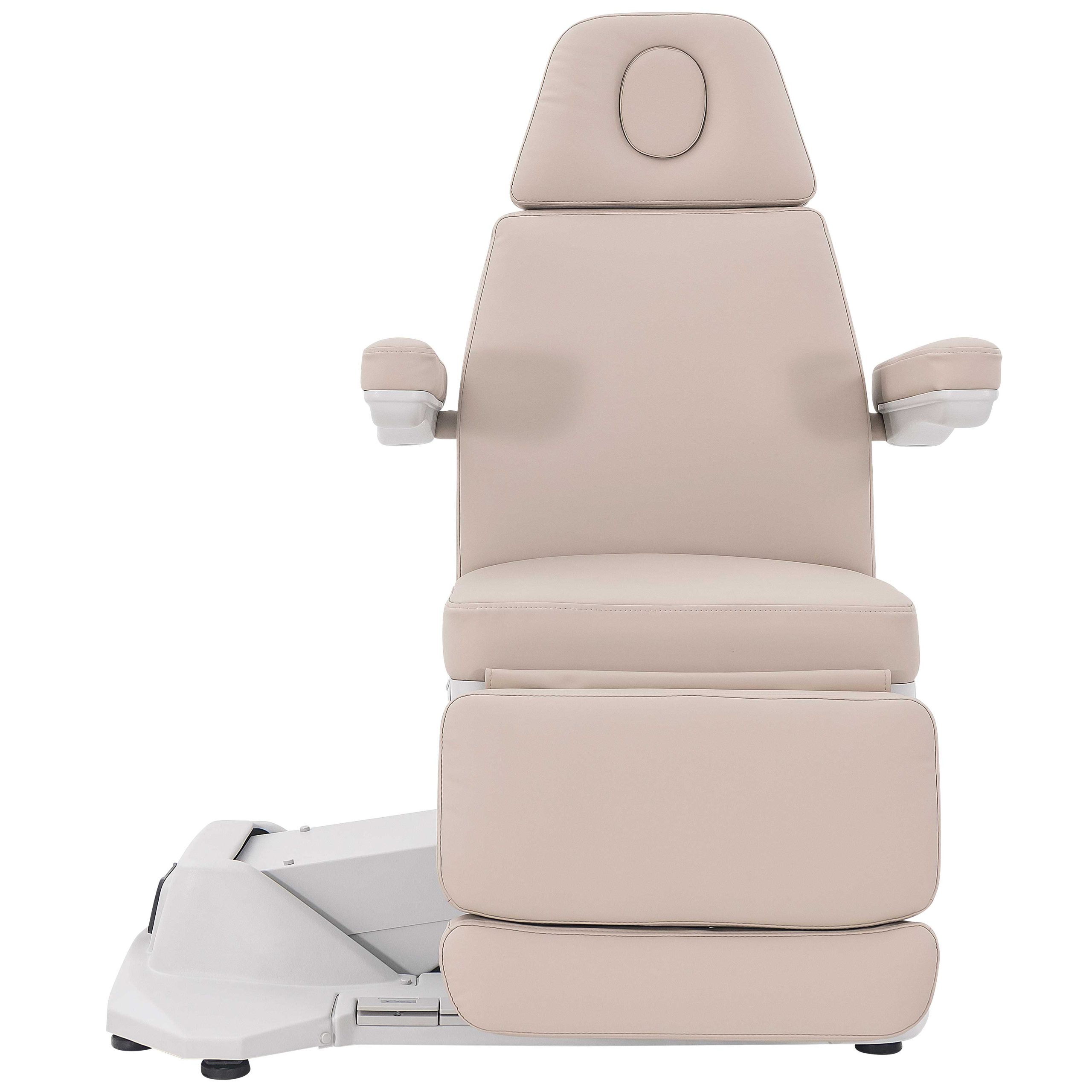 Beige medical reclining chair with padded backrest, headrest, and armrests, shown from side with white base and wheels visible