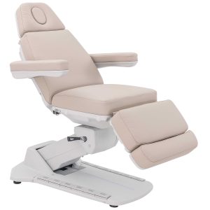 Beige padded reclining chair with armrests and adjustable leg rest viewed from the side.