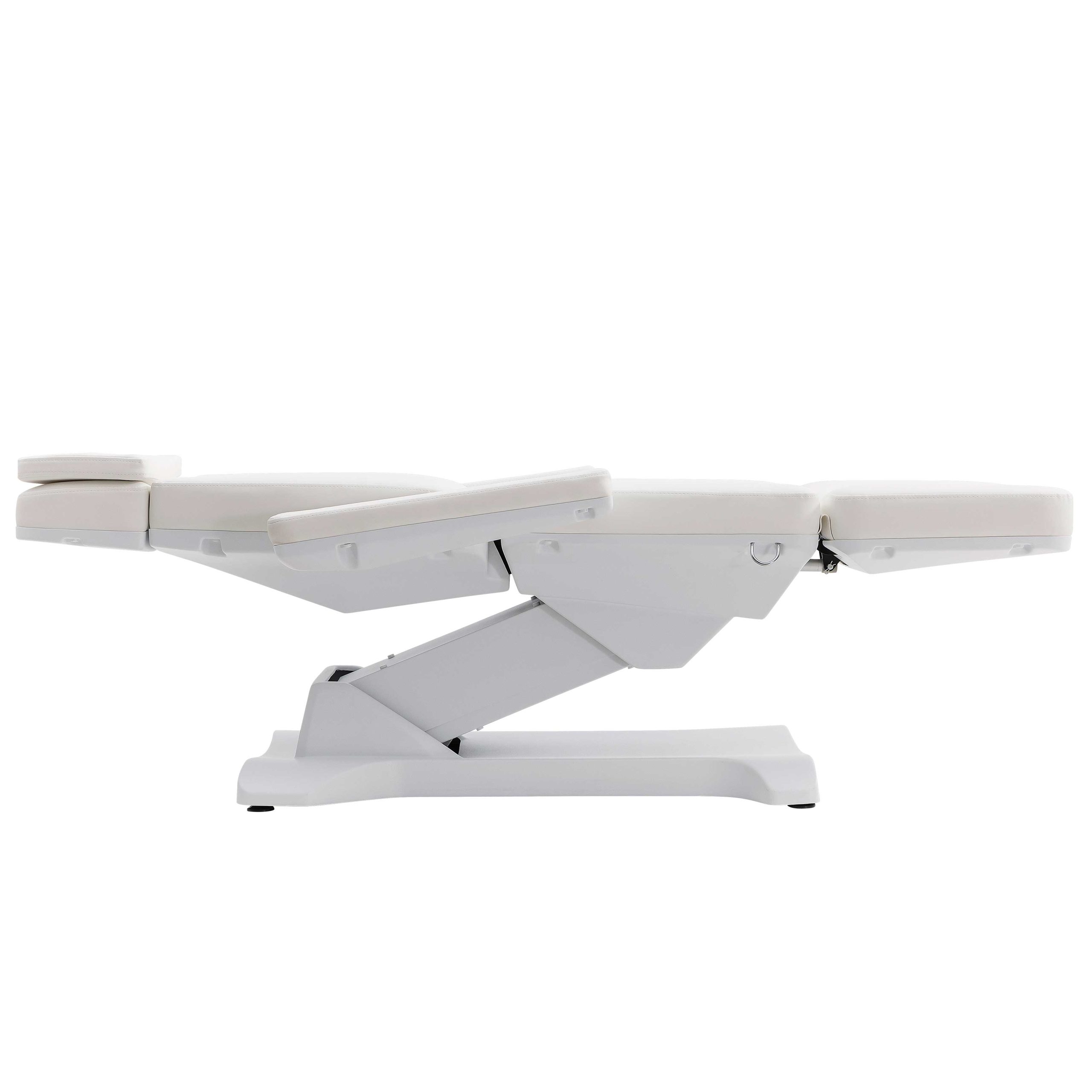 White medical reclining chair fully extended flat with multiple cushioned sections and a sturdy base