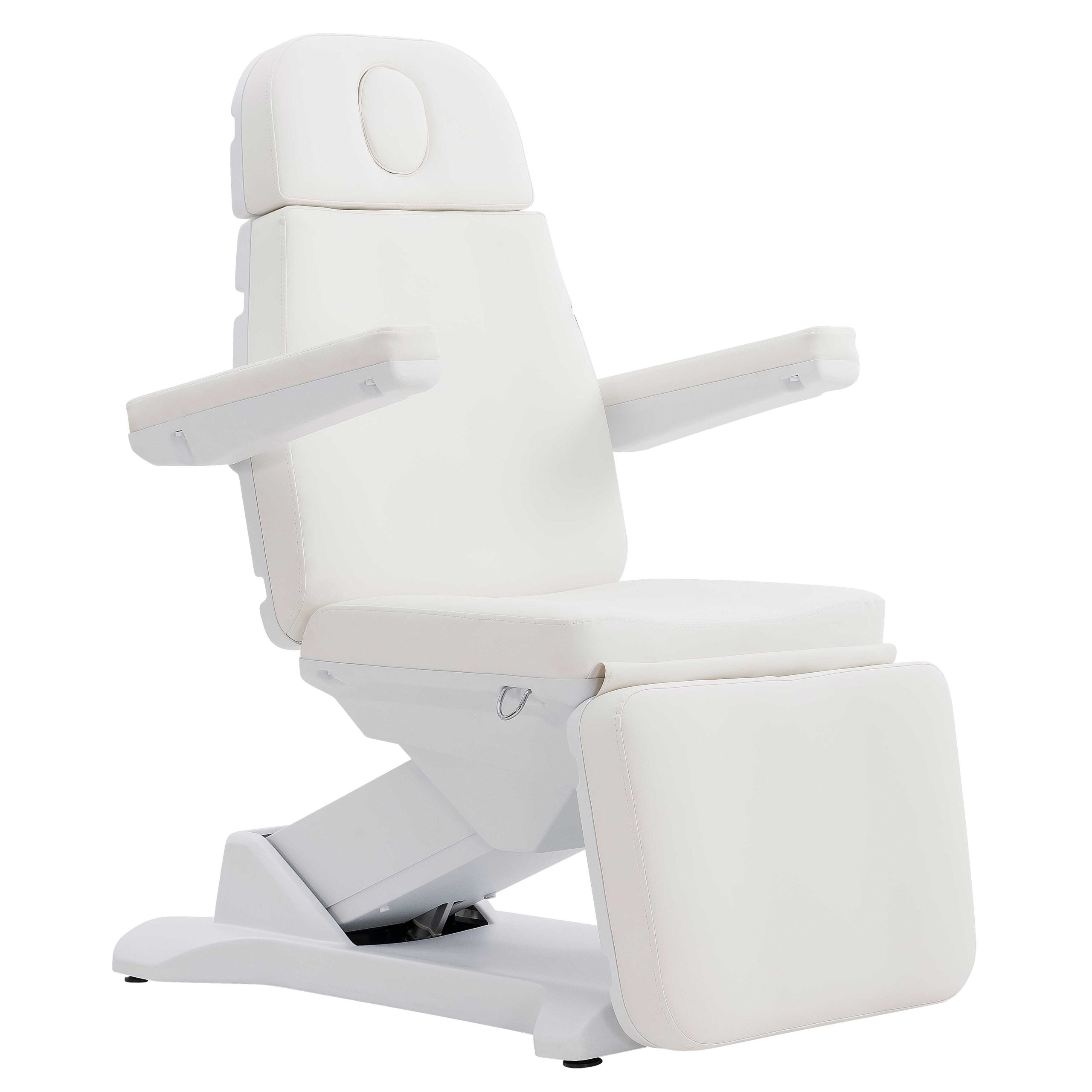 White reclining chair with extended leg rest and padded headrest, view from the side.