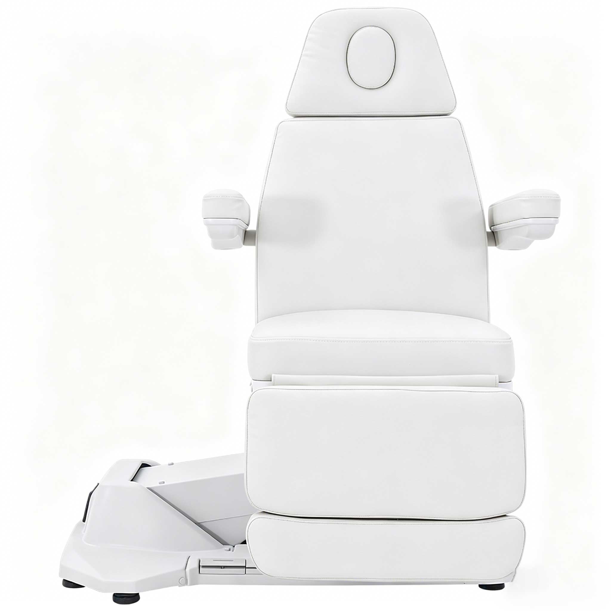 White reclining medical chair with padded headrest and armrests against a pale background.